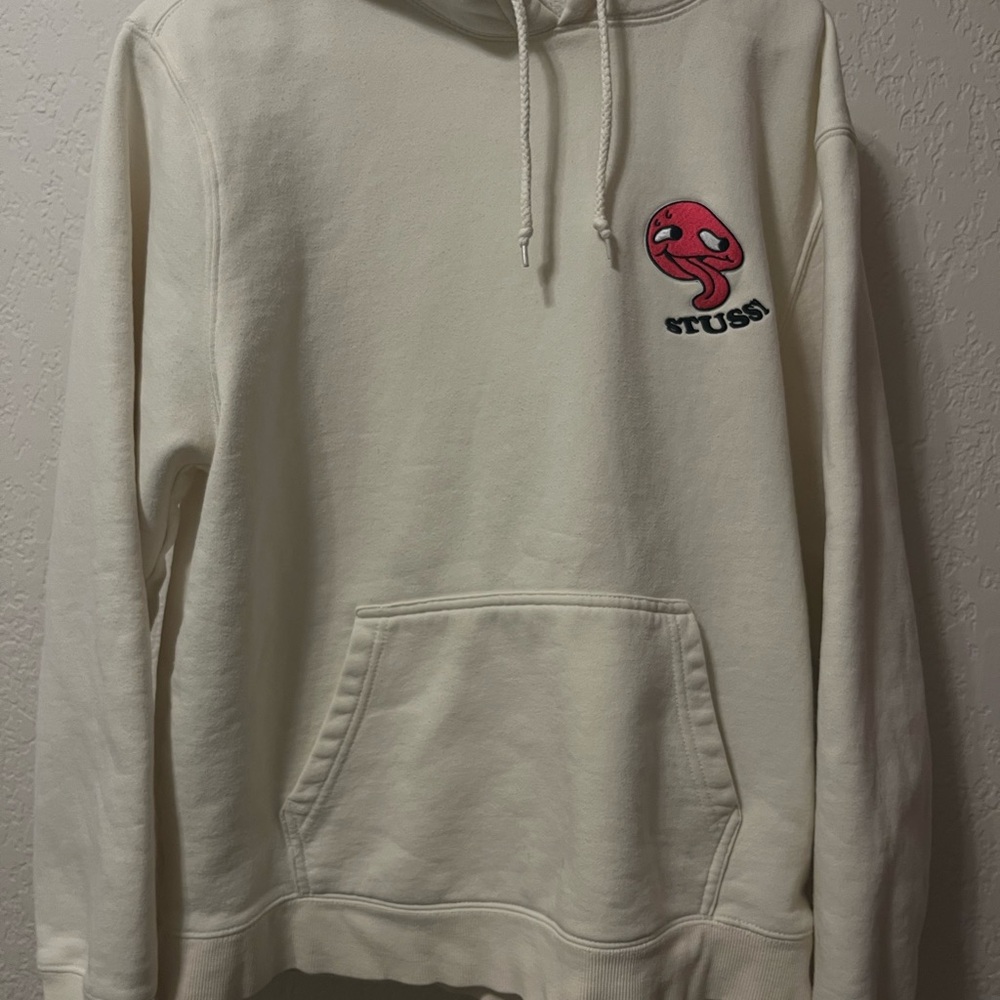 Stussy Off-White Hoodie with Red Graphic